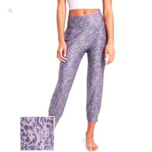 Athleta Salutation Printed Crop Jogger Purple  size Small Animal Performance